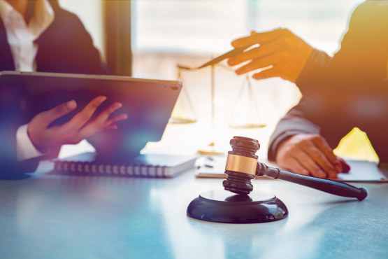 Legal law, advice and justice concept,Business lawyer working about legal legislation in courtroom to help their customer.